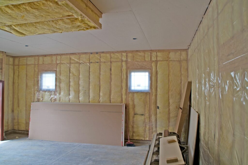 Panels of garage door and garage insulation